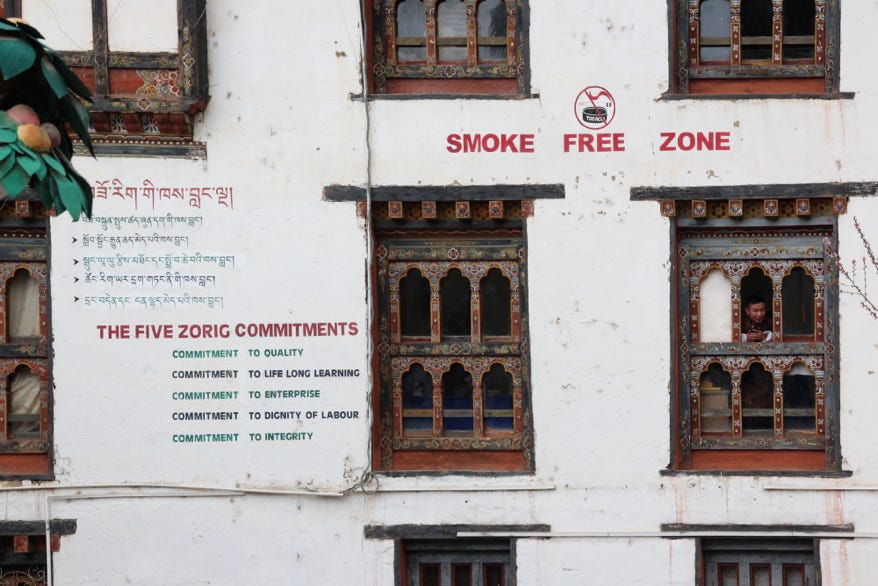 The external walls of the National Institute for Zorig Chusam (a specialist high school for the visual arts in Thimpu, Bhutan) outline the school’s commitment to its five core values: (i) quality; (ii) life-long learning; (iii) enterprise, (iv) dignity of labour; and (v) integrity. 