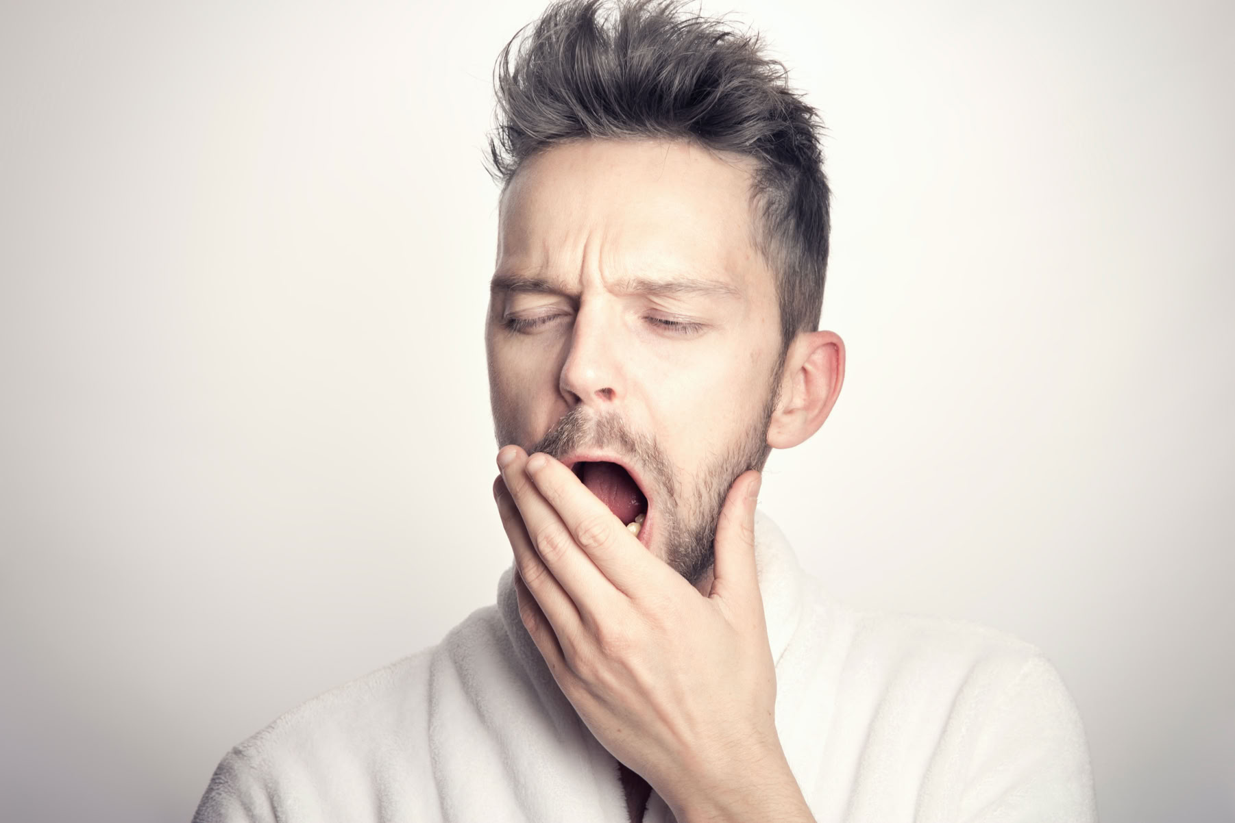 Disengaged board member yawning