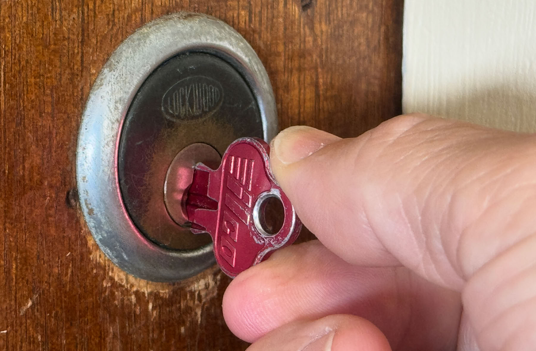 The image illustrates the differences between the role of the Board Secretary and the Company Secretary on a school board using the following instructions:. Image Format: Landscape (16:9) Style: Clean, modern infographic style with symbolic, split-frame imagery. Use a cohesive color palette: perhaps blues/greens (for governance/education) with contrasting accent colors (e.g., deep blue for internal focus, amber for external/compliance). Overall Composition: Divide the canvas vertically into two distinct halves, separated by a central, stylized school emblem (e.g., a shield, tree, or book) that bridges both sides. Left Half: THE BOARD SECRETARY Primary Visual Metaphor: A meeting table in a school library or boardroom. The focus is on people, discussion, and governance within the school community. Key Elements: 1. Central Figure: A person (gender-neutral) sits at the head of a table, actively facilitating a discussion. They are pointing to a meeting agenda document titled "Board Pack." 2. Table Elements: On the table: o An open minute book with handwritten notes. o A copy of the School's Constitution/Charter. o A clock, symbolizing timelines and terms of office. o A nameplate that says "Board Secretary." 3. Background/Periphery: Silhouettes of other board members (diverse) around the table. On a wall, a calendar with key governance dates circled (AGM, Board Elections). 4. Iconography & Labels (floating subtly near relevant elements): o Core Function: Governance & Procedure o Focus: The Board Itself o Key Outputs: Minutes, Agendas, Governance Cycles o Accountable to: The Board Chair & Board Members o Sphere: Internal Governance Right Half: THE COMPANY SECRETARY Primary Visual Metaphor: A bridge or intersection connecting the school building to external institutions. The focus is on compliance, legal frameworks, and external interfaces. Key Elements: 1. Central Figure: A different person (gender-neutral) stands at a desk that acts as a bridge. One hand holds a filing document going to an icon of “Legal Requirements”. The other hand points to a school building. 2. Desk/Bridge Elements: On the desk: o A stamp that says "Approved and Filed." o A legal ledger or tablet showing the Companies Act. o A nameplate that says "Company Secretary." o Stacked documents: "Annual Returns," "Financial Statements," "Director Updates." 3. Background/Periphery: On one side, a stylized school building. On the other, icons representing external entities: a government building, a scale of justice, a financial chart. 4. Iconography & Labels (floating subtly near relevant elements): o Core Function: Compliance & Legal Integrity o Focus: The Legal Entity (School Ltd/Inc) o Key Outputs: Statutory Filings, Legal Advice, Risk Registers o Accountable to: The Board (as a whole) & Regulatory Bodies o Sphere: External Compliance & Law Central Divider & Unifying Elements: • The school emblem in the center should incorporate symbols of both (e.g., a quill for minutes and a seal for legal authority). • Beneath the emblem, a key clarifying statement in bold: "One ensures effective governance; the other ensures legal compliance." • Use a subtle, flowing pattern (like interconnected lines or a roadmap) in the background to suggest that both roles are essential for the school's health and stability. Color & Tone: • Left (Board Secretary): Warmer, slightly softer tones (soft blue, charcoal). Focus on people and paper. • Right (Company Secretary): Sharper, more formal tones (deep blue, grey, with amber accents). Focus on documents and institutions. • Overall: Professional, clear, and authoritative, fitting for a governance document or training material. Objective: The viewer should instantly grasp that the Board Secretary is inwardly focused on board process, while the Company Secretary is outwardly focused on legal obligation—both critical to the school's operation.